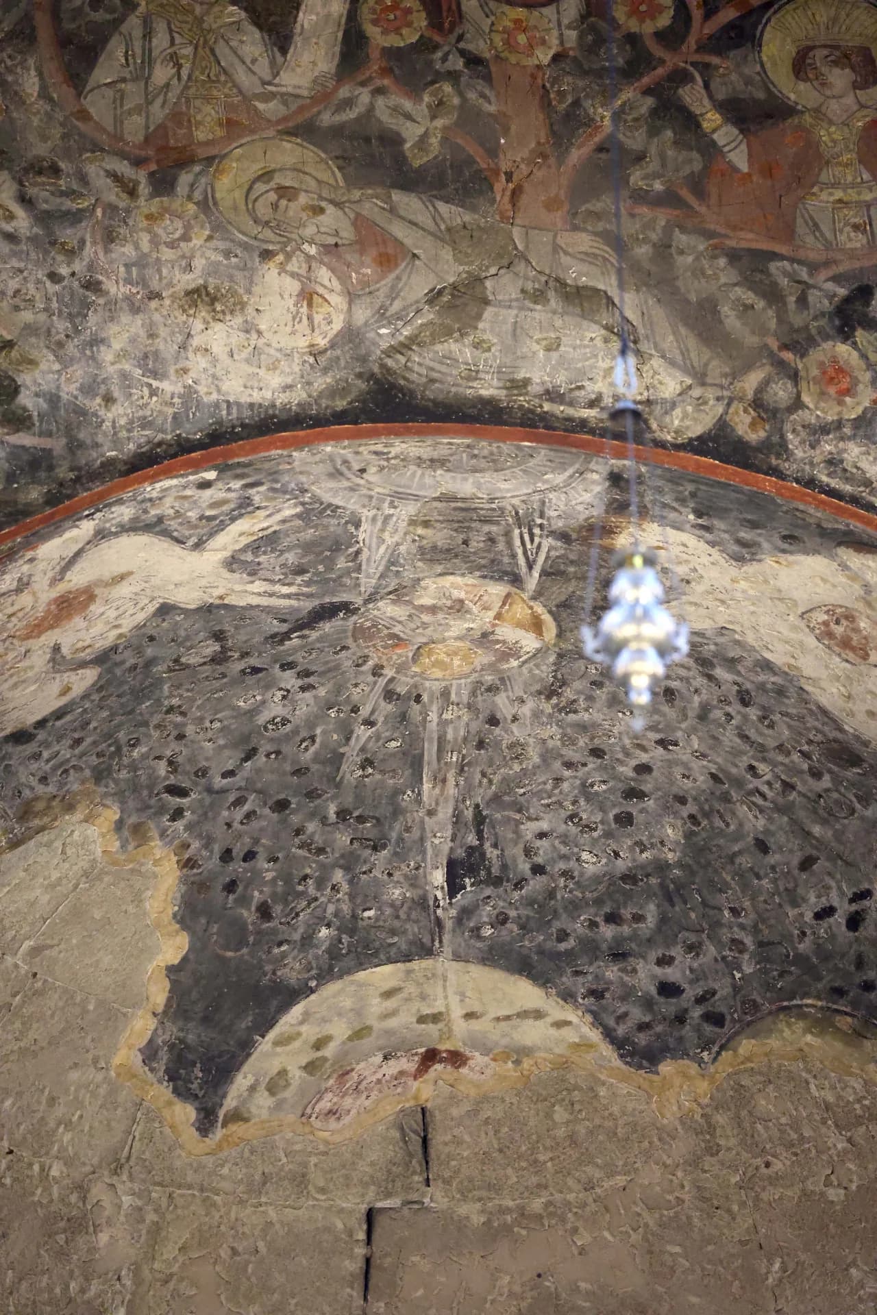 Surviving fragment of the conch painting. 17th century.